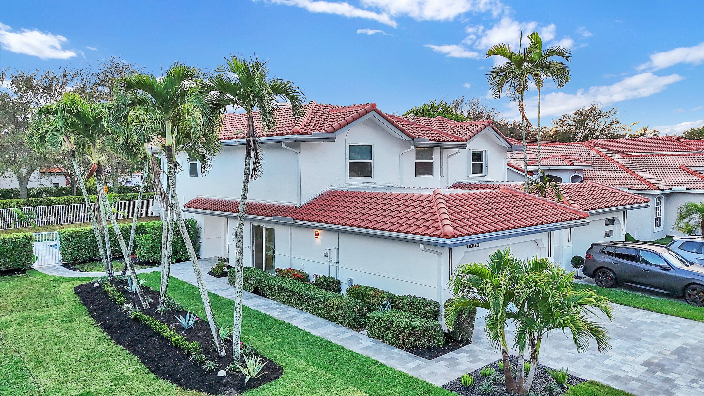 Fully renovated 3BR 2. 5BA, 2 car garage pool home in a man gated, pet friendly West Boca community with A rated schools.