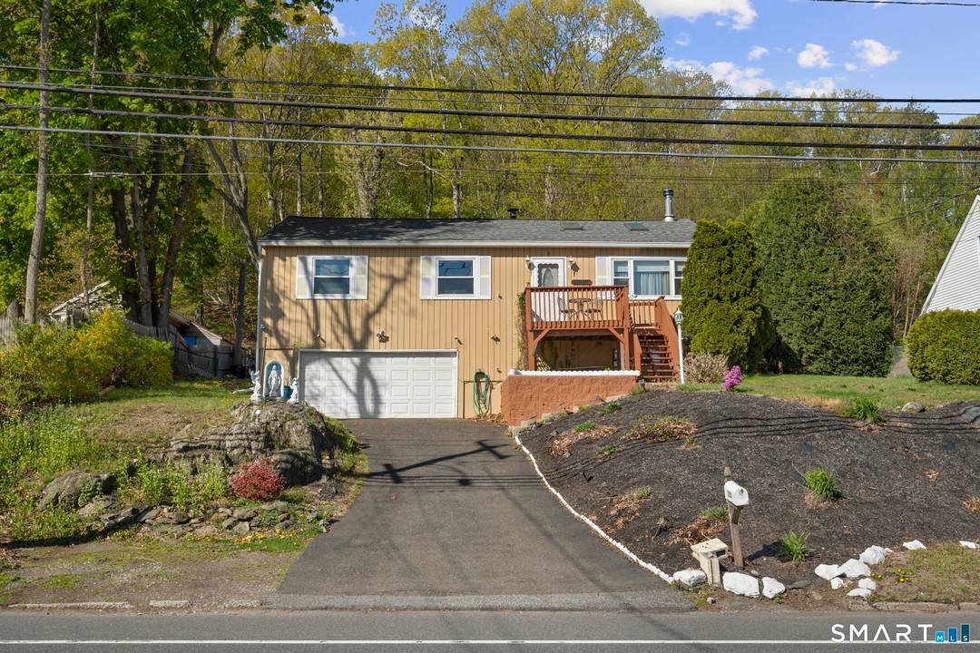 Welcome to this 3 bedroom, 3 bath raised ranch offering a spacious and functional layout with great potential.