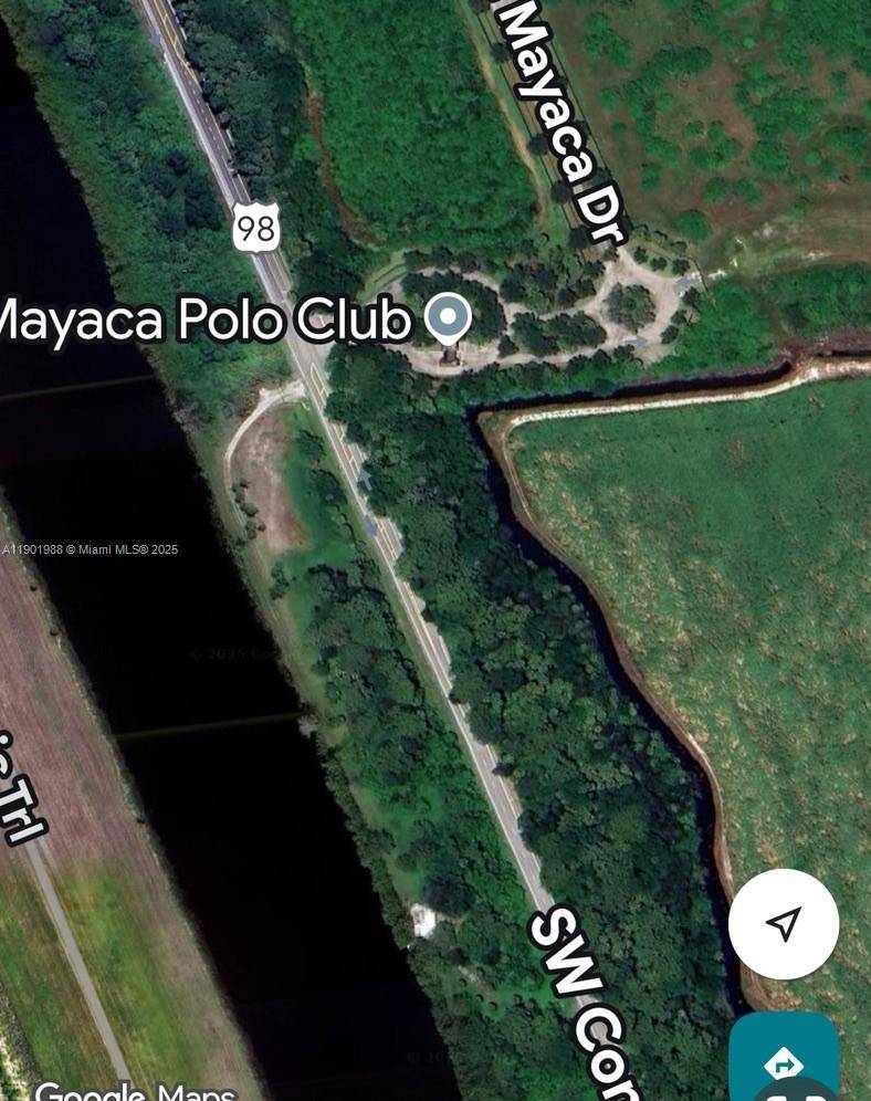 A Fruiting Paradise for the Nature and Fishing Enthusiast Discover a rare piece of 'real Florida paradise' with this stunning 2 acre, tropical planted lot in Port Mayaca.