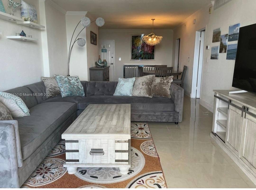 beautiful 1 11 2 condo on the ocean offered turnkey with magnificent views of the intracoastal.