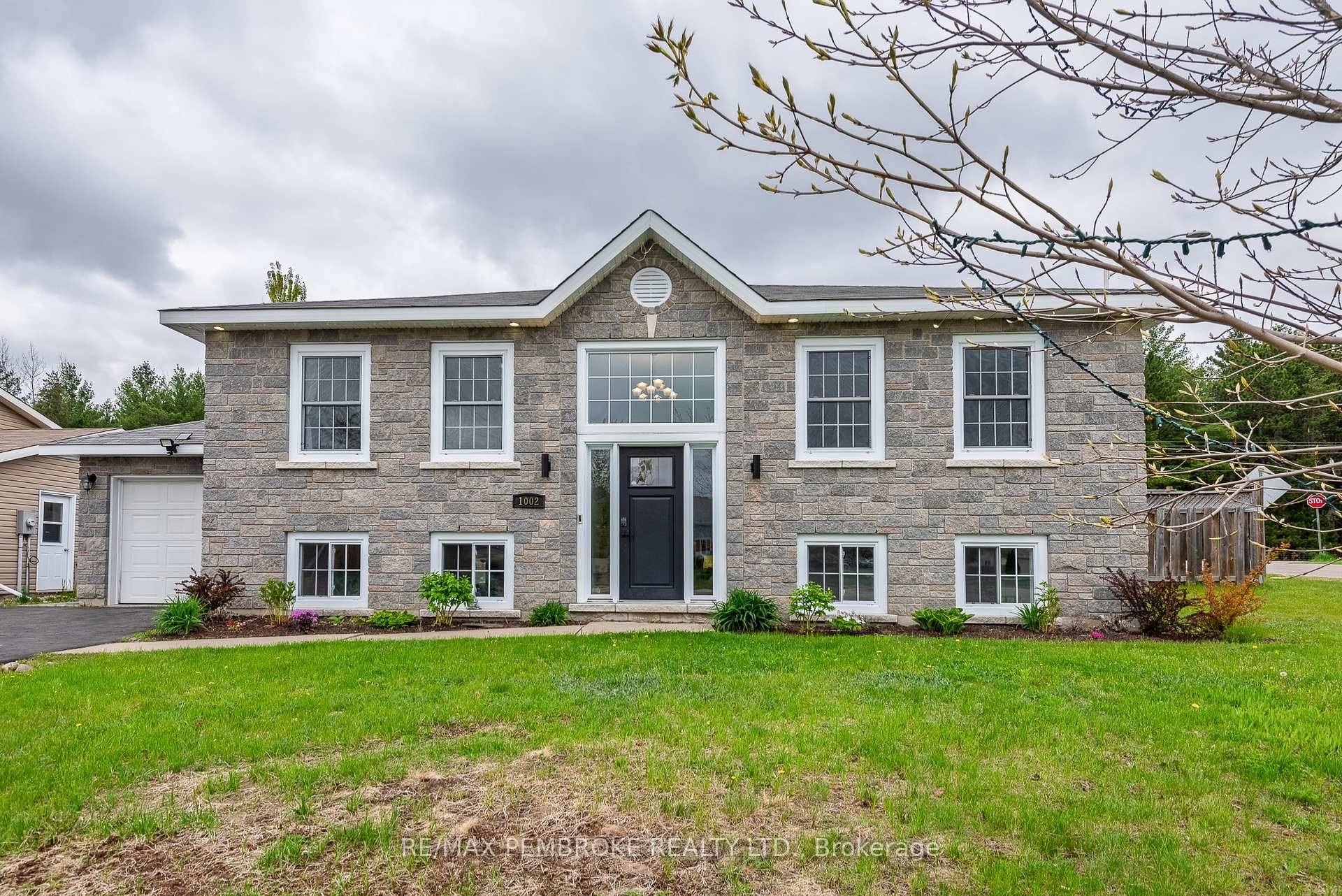 Welcome to this bright and welcoming split entry home, ideally situated close to schools, parks, shopping, and more.