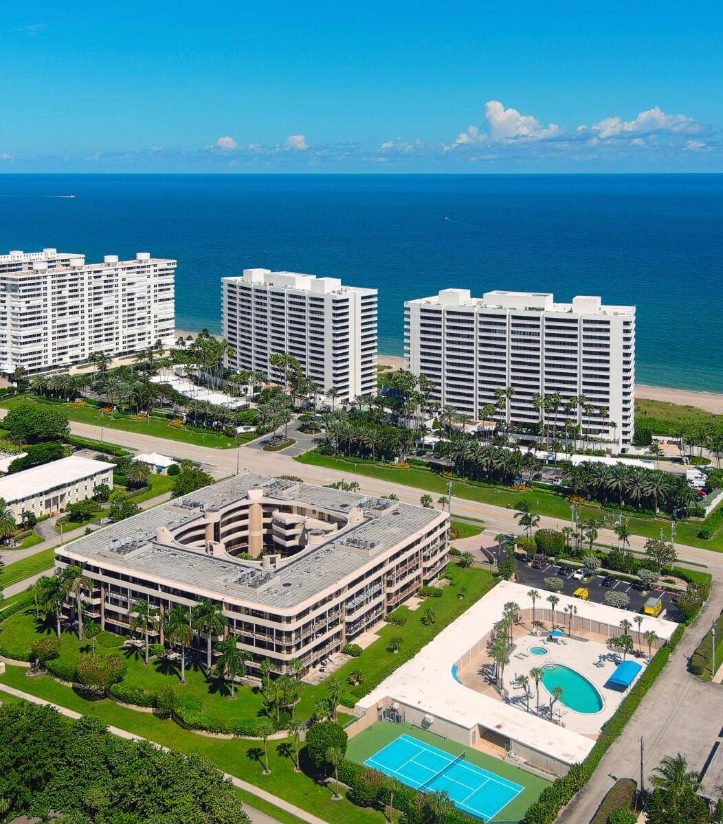 This stunning residence is located across from the beach with deeded beach access and features an updated kitchen with gorgeous quartz counters and sleek cabinetry.