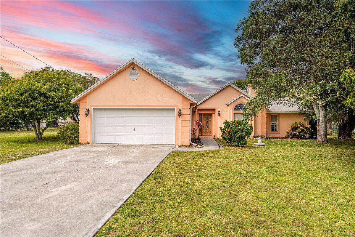 Tucked away on a rare half acre lot with stunning canal views, this CBS built 3 bedroom, 2 bath home offers the perfect mix of space and convenience.