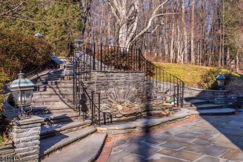 Set within the storied gates of Llewellyn Park, 5 Rocky Way offers a rare blend of privacy, scale, and timeless elegance on a wooded, secluded lot with a quiet, serene ...