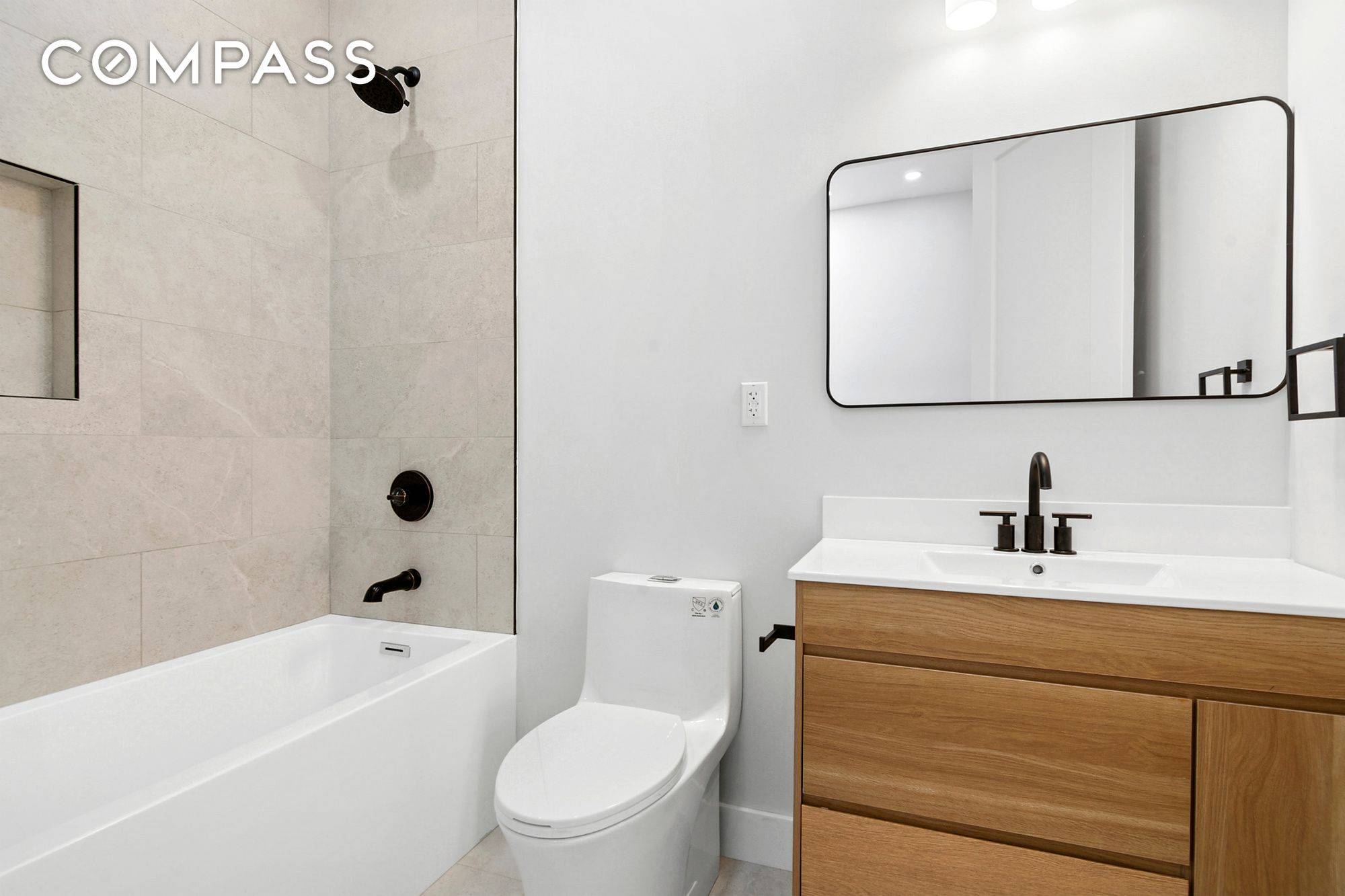 Welcome to a rare and radiant offering an exquisitely renovated multi family townhouse perfectly positioned just two blocks from Ditmars Boulevard.