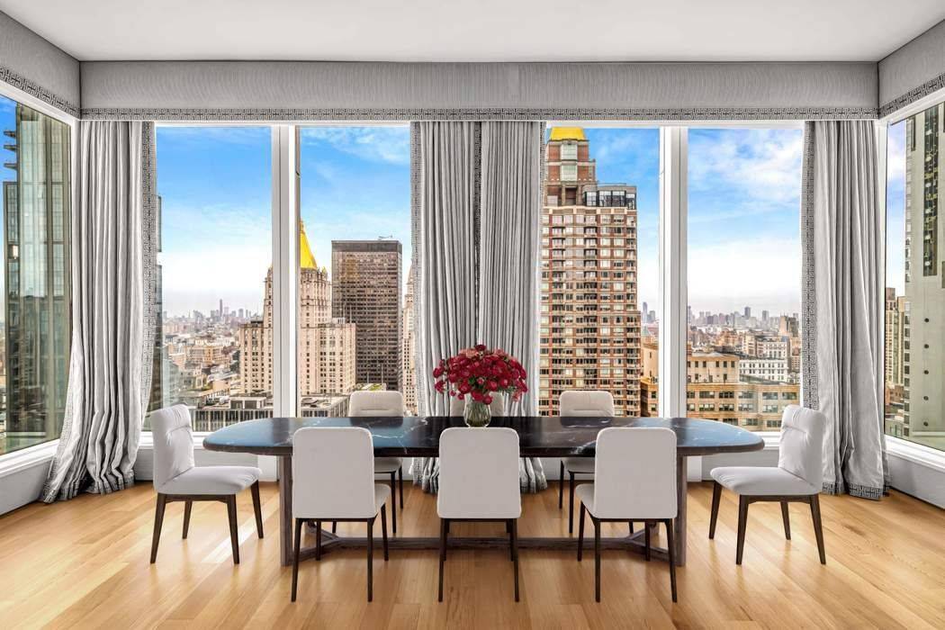 Sun Filled Corner Residence with Panoramic Views at Madison House This exceptional two bedroom, two and a half bath corner residence offers approximately 1, 650 square feet of refined living, ...