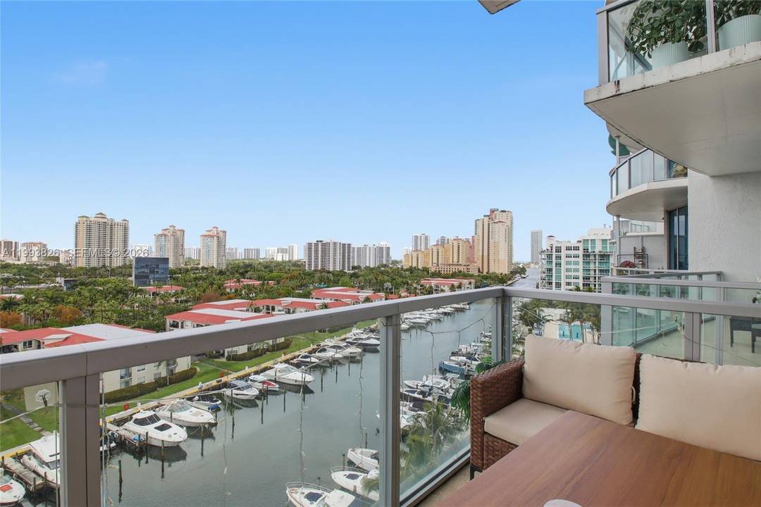 Rare opportunity to own a true loft style residence in the heart of Aventura with soaring 11 ceilings and dramatic floor to ceiling impact windows showcasing beautiful flow through water ...