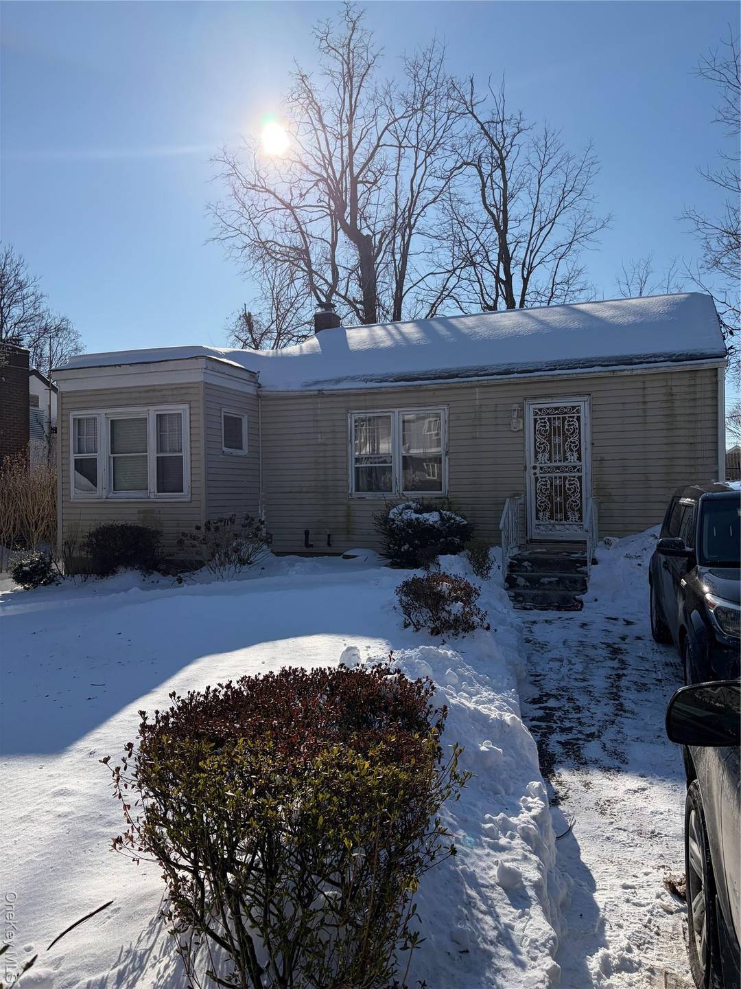 Welcome to 18 Melrose Avenue, a fantastic investment opportunity in the heart of East Northport.