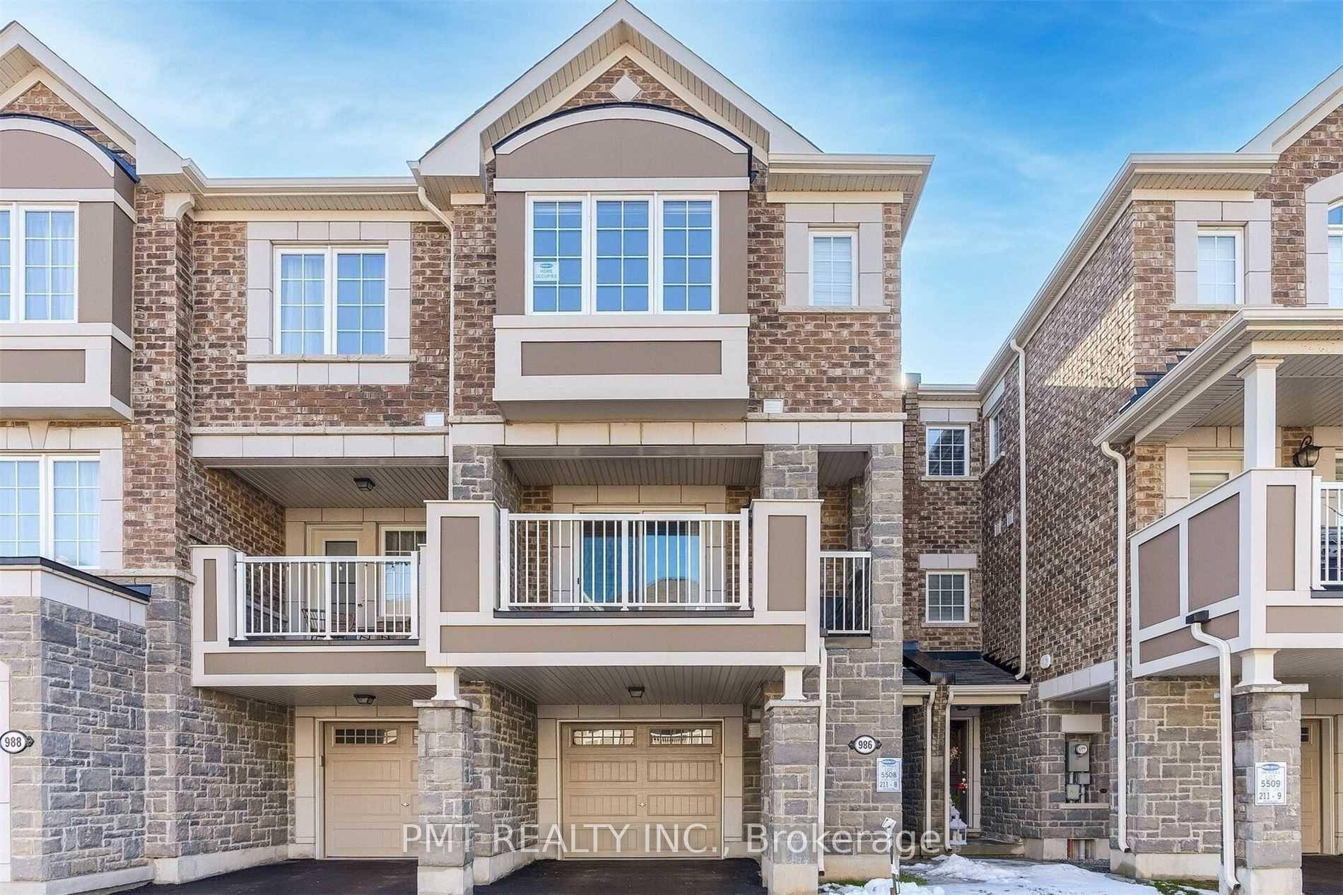 Welcome to 986 Alder Gate, a charming townhome in Milton's desirable Cobban community !