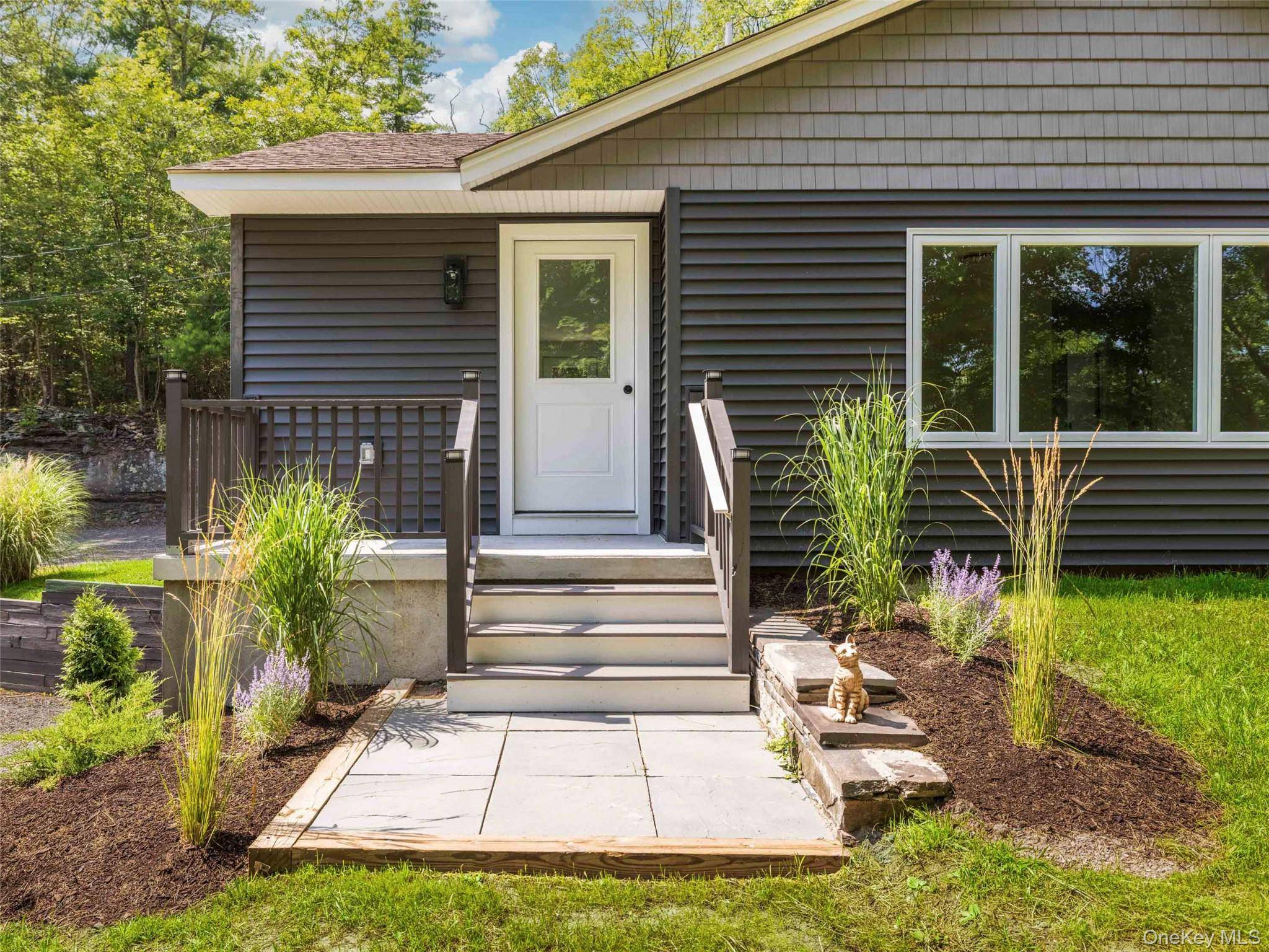 Welcome to your dream home, nestled in the serene landscape that perfectly balances country charm with modern convenience.