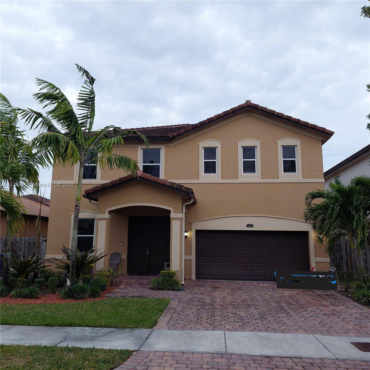 Spacious 5 bedroom, 3 bath home with a 2 car garage with in law quarters in the beautiful suburbs of Miami in Southwest Miami Dade County close to Homestead.