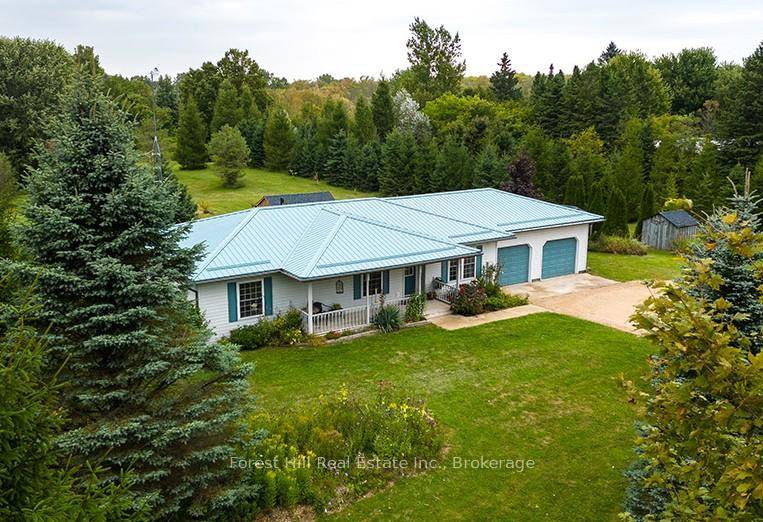 Discover the perfect balance of independence and connection at 504097 Grey Road 12.