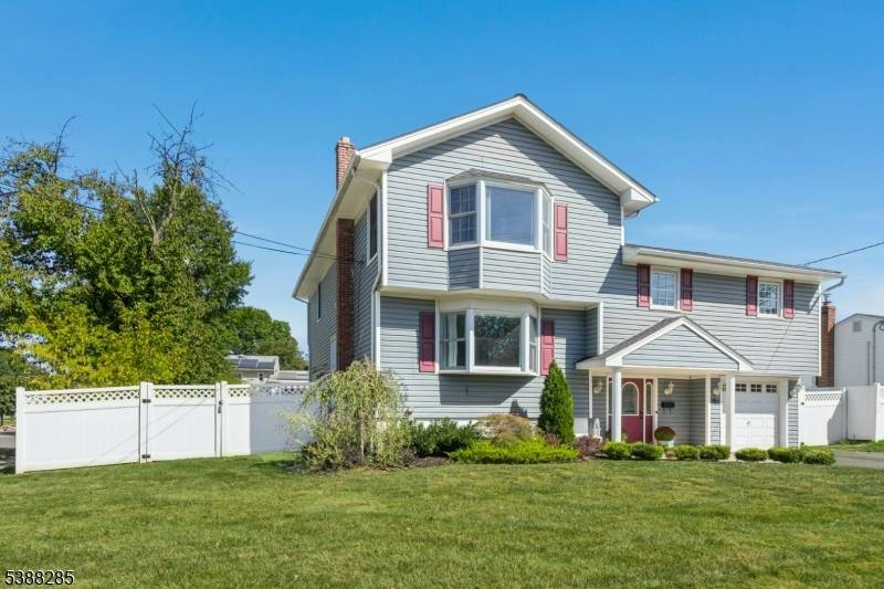 Spacious 4 level home with an 1, 800 sq ft addition and numerous updates throughout.