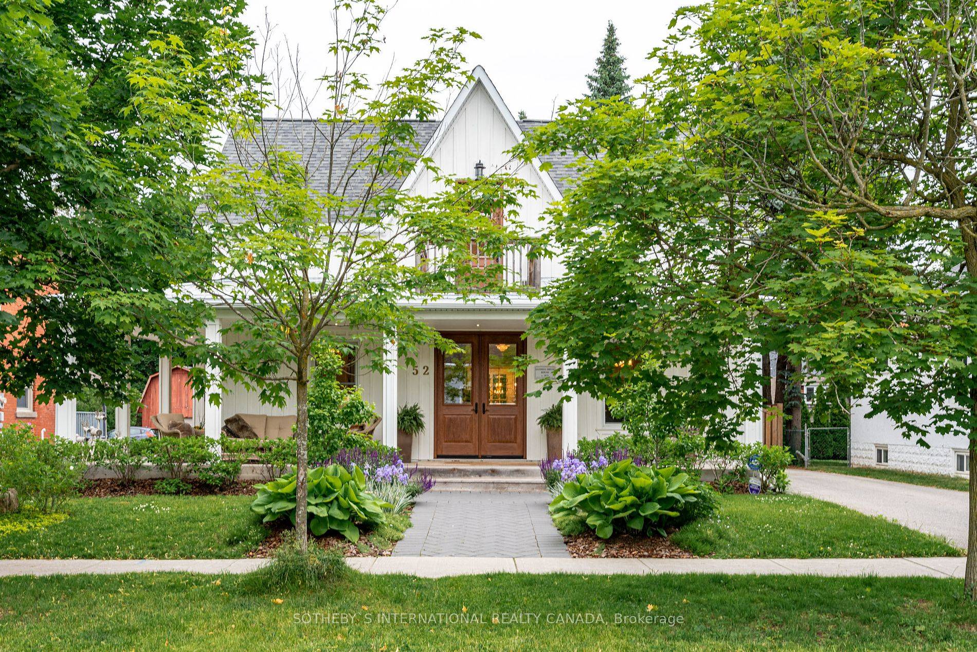 Beautifully Renovated Throughout, A Centre Hall Plan Opens To A Private Office And A Living Room With Custom Built Ins And Wood Burning Fireplace.