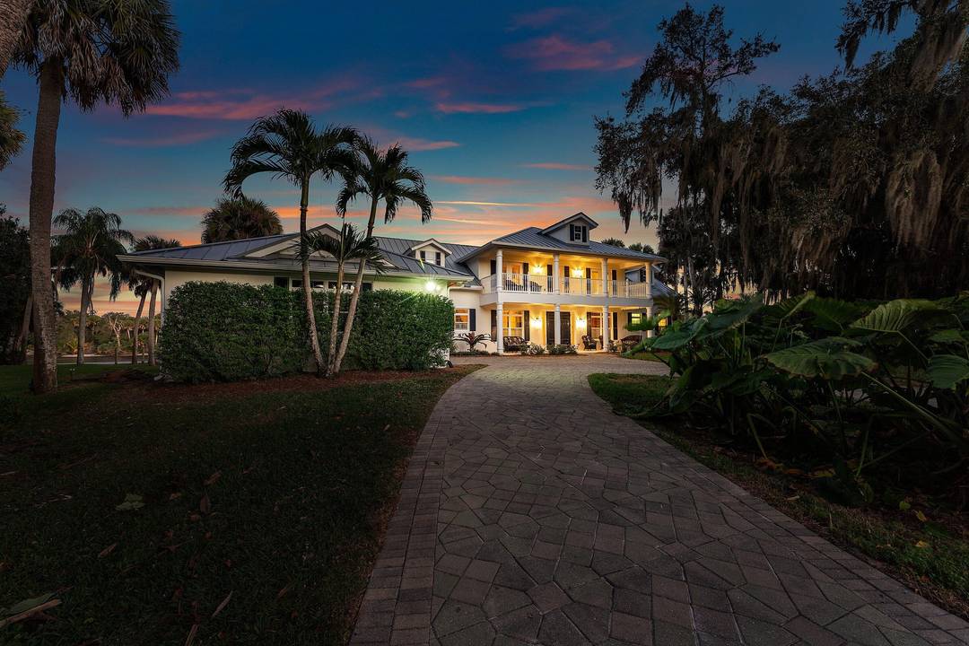 Welcome to Imagination Plantation, a 5 bedroom, 4 bath waterfront estate on 4 acres in Palm City including a 3 acre vacant buildable lot fronting the main residence.