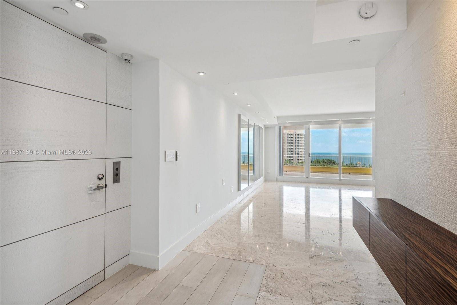 High floor renovated 2 Bedroom 2 Bath Den at the prestigious Ocean Club in Key Biscayne.