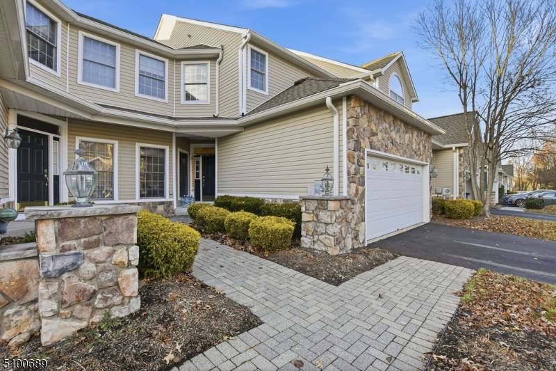 Sophisticated townhome in sought after 'Luxury Gated Community' Fairways, but feels more like a single family home.