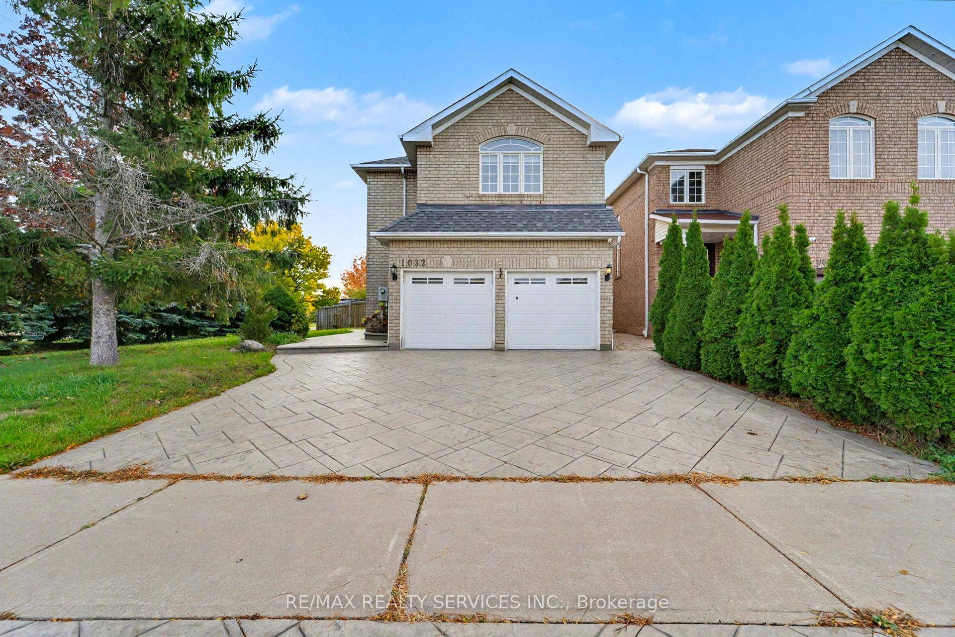 Gorgeous 4 bedroom corner lot detached home with a double car garage located in the heart of East Credit.
