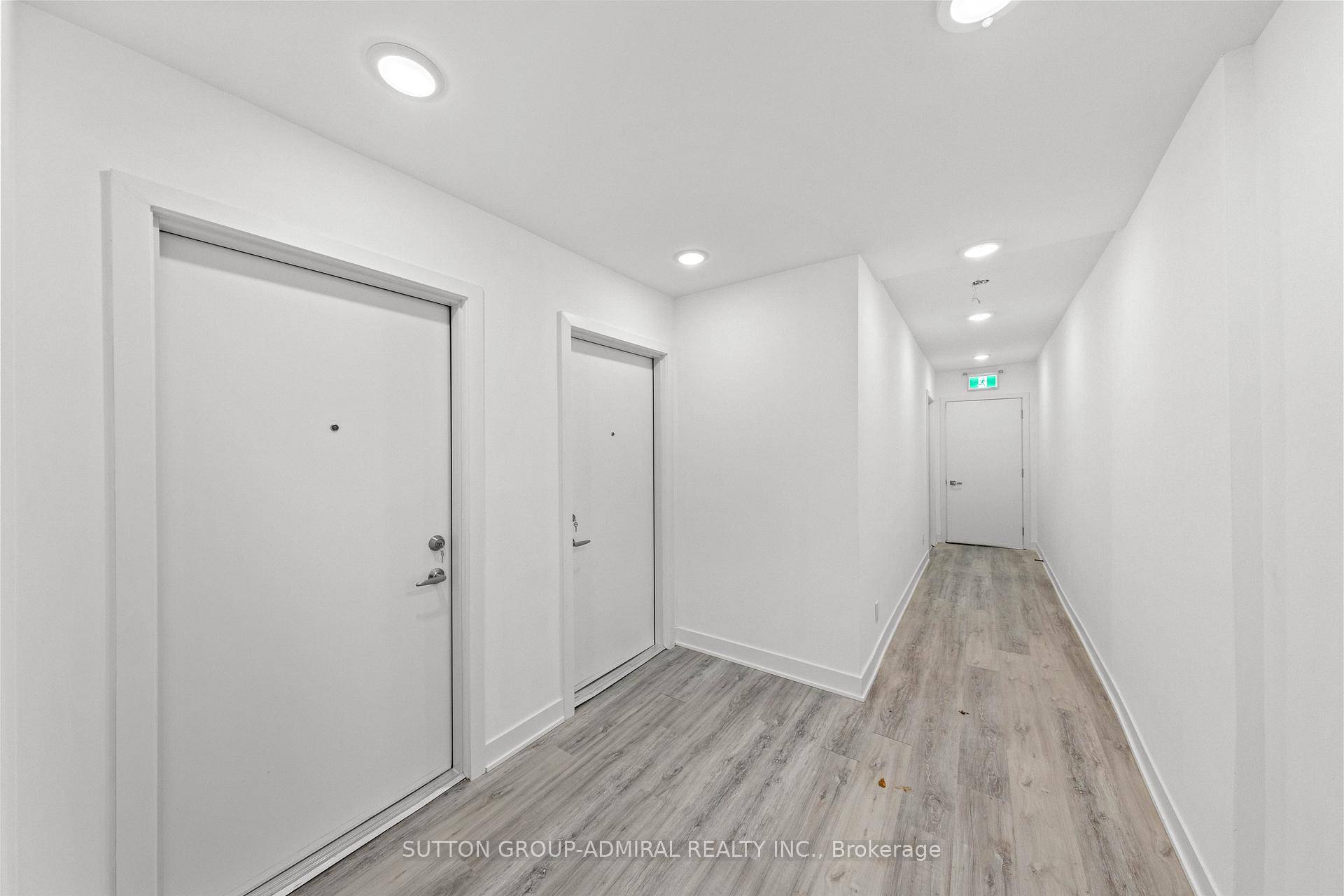 This beautiful, newly constructed apartment offers a spacious and bright open concept design, situated above a storefront in a convenient location.