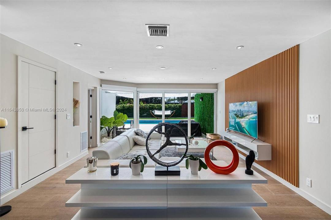 This contemporary home w POOL has been meticulously crafted to feel brand new Entirely remodeled with permits.