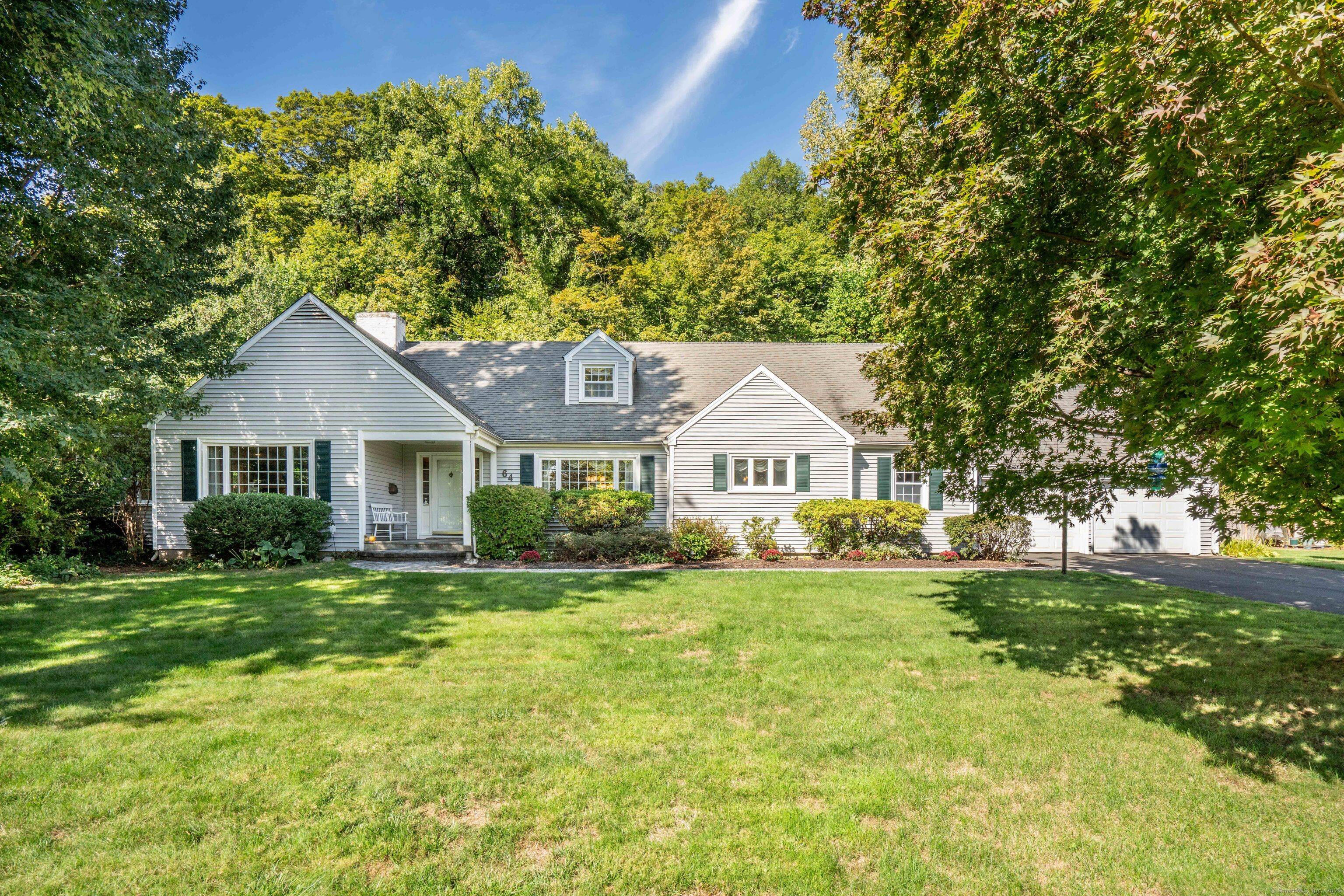 Welcome to this beautifully maintained 4 bedroom, 3 bath home, perfectly set on a rare, level 1.