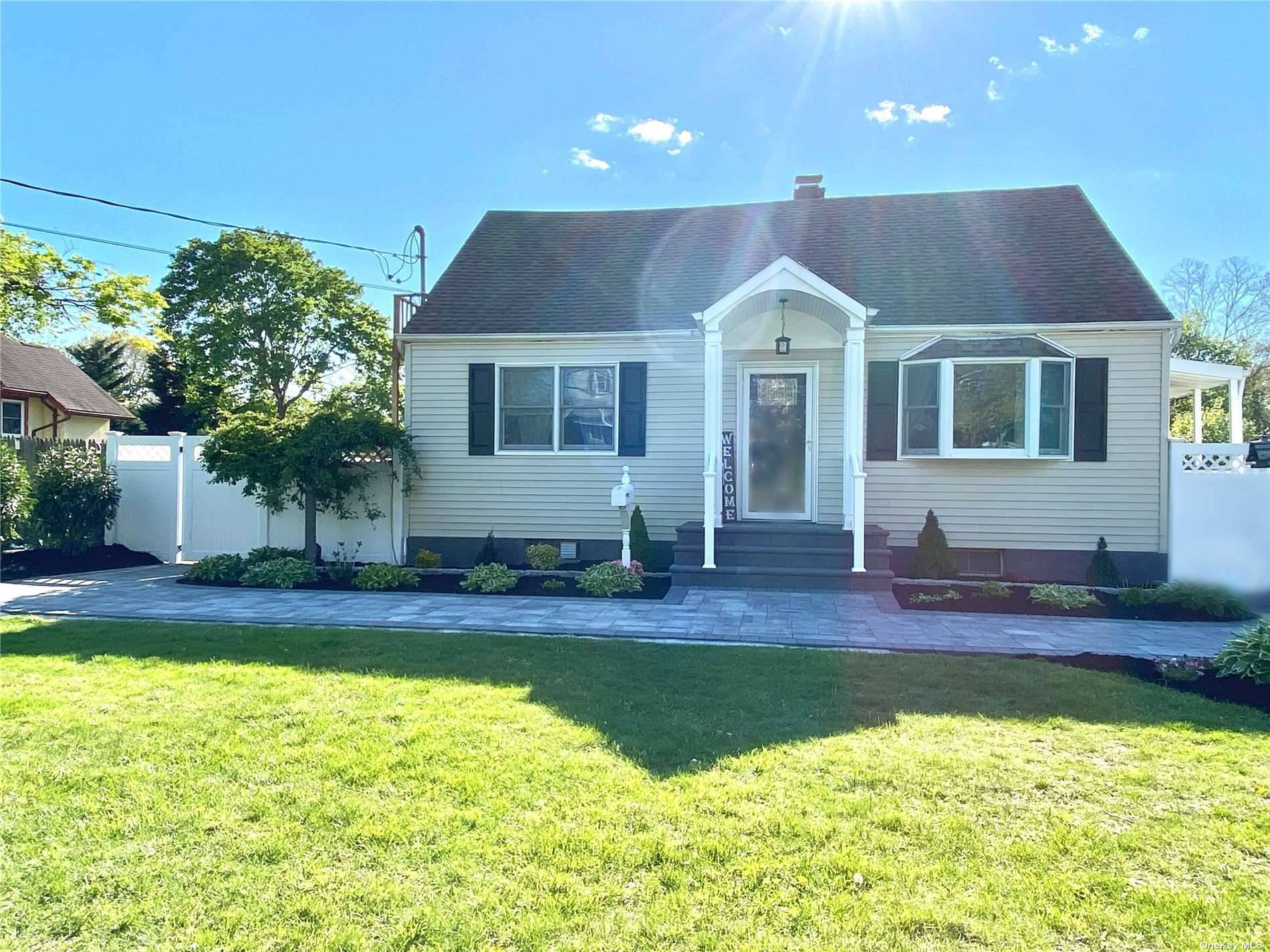 Move Right into this Cape Style Home Located Near Long Island Expressway and LIRR.