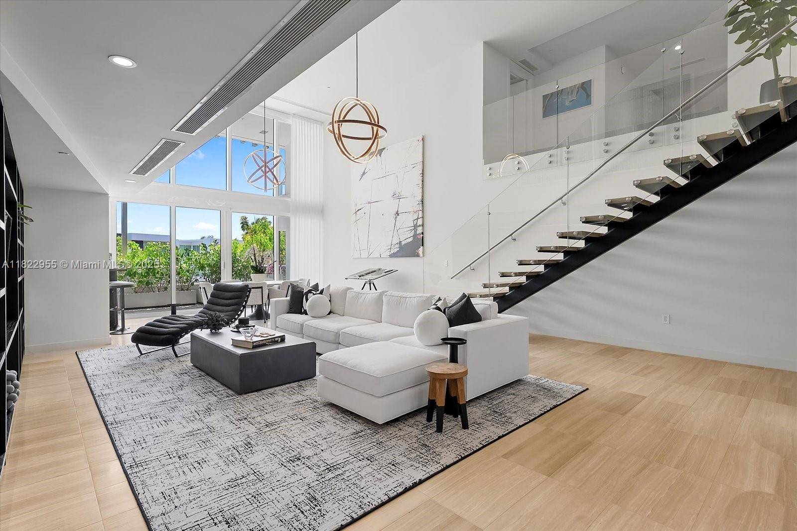 Residence 217 at The Ritz Carlton Residences, Miami Beach offers the space of a private home with the convenience of condo living a rare two story masterpiece of dramatic scale ...