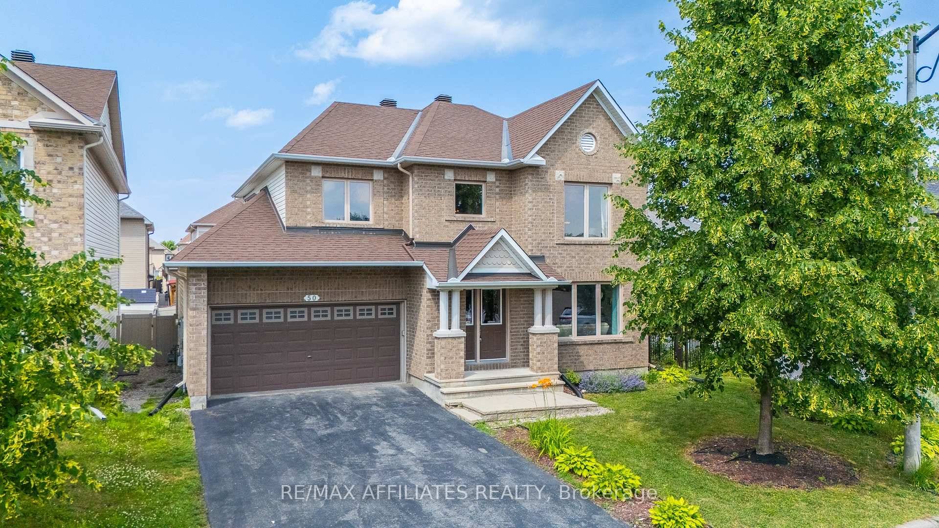 Welcome to 50 Cormack Circle a beautiful, sun filled corner lot home nestled in a quiet, family friendly neighborhood in Barrhaven.