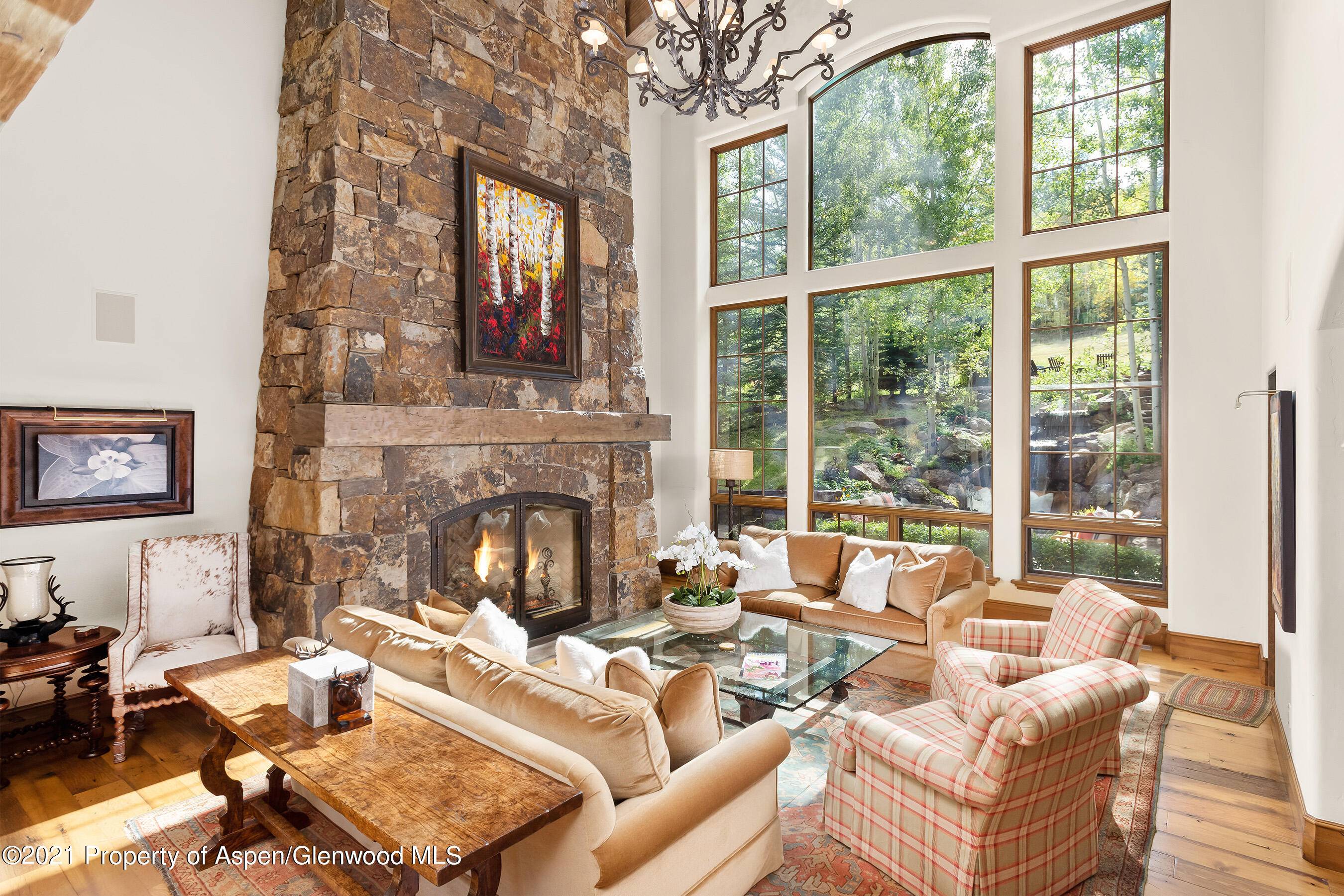 Five bedroom home boasts direct ski in out access onto Tiehack at Buttermilk mountain from the slopeside patio.