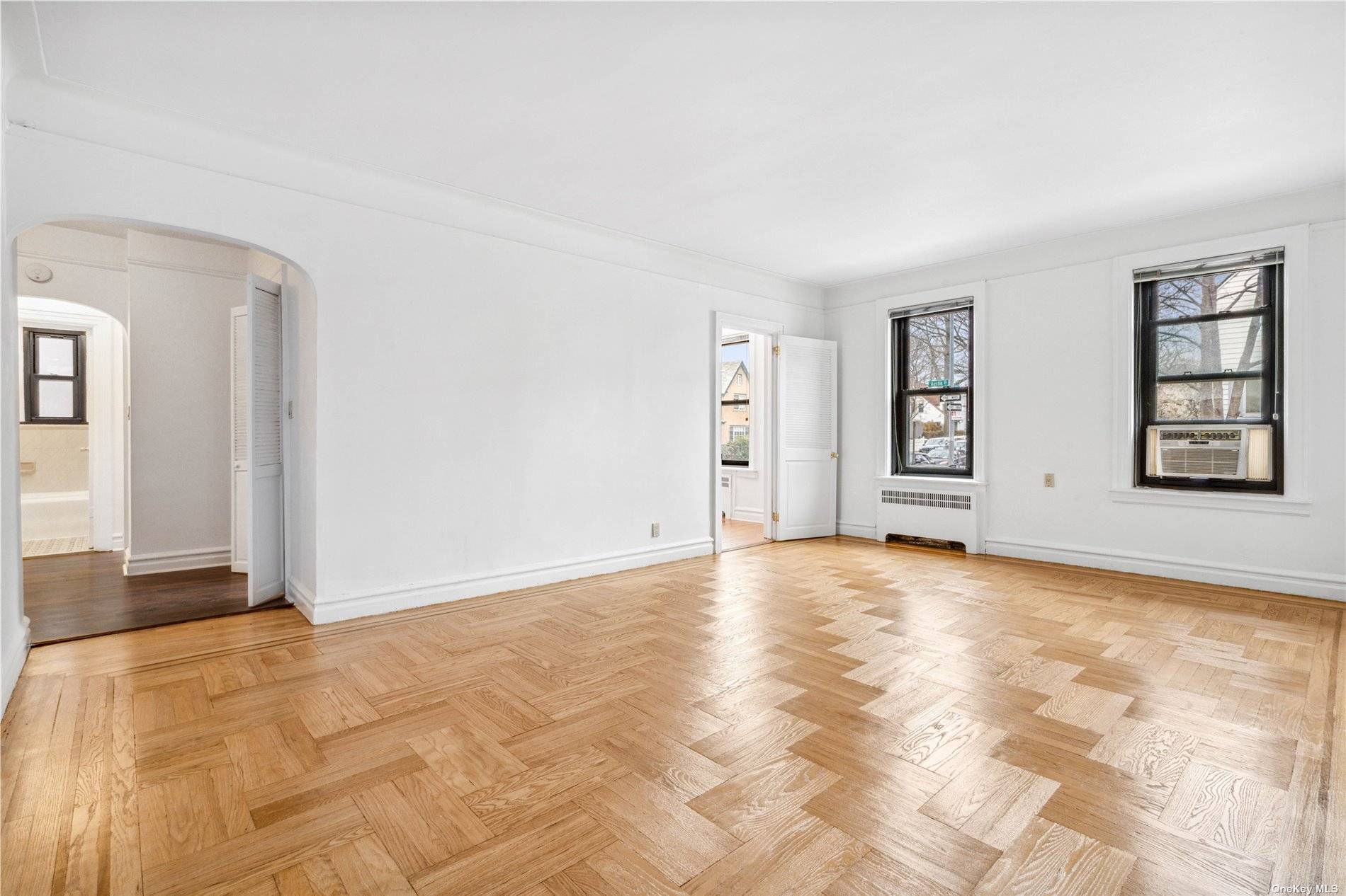 Classic prewar move in ready bright and sunny one bedroom with gleaming refinished oak floors, mahogany inlays and new paint throughout.