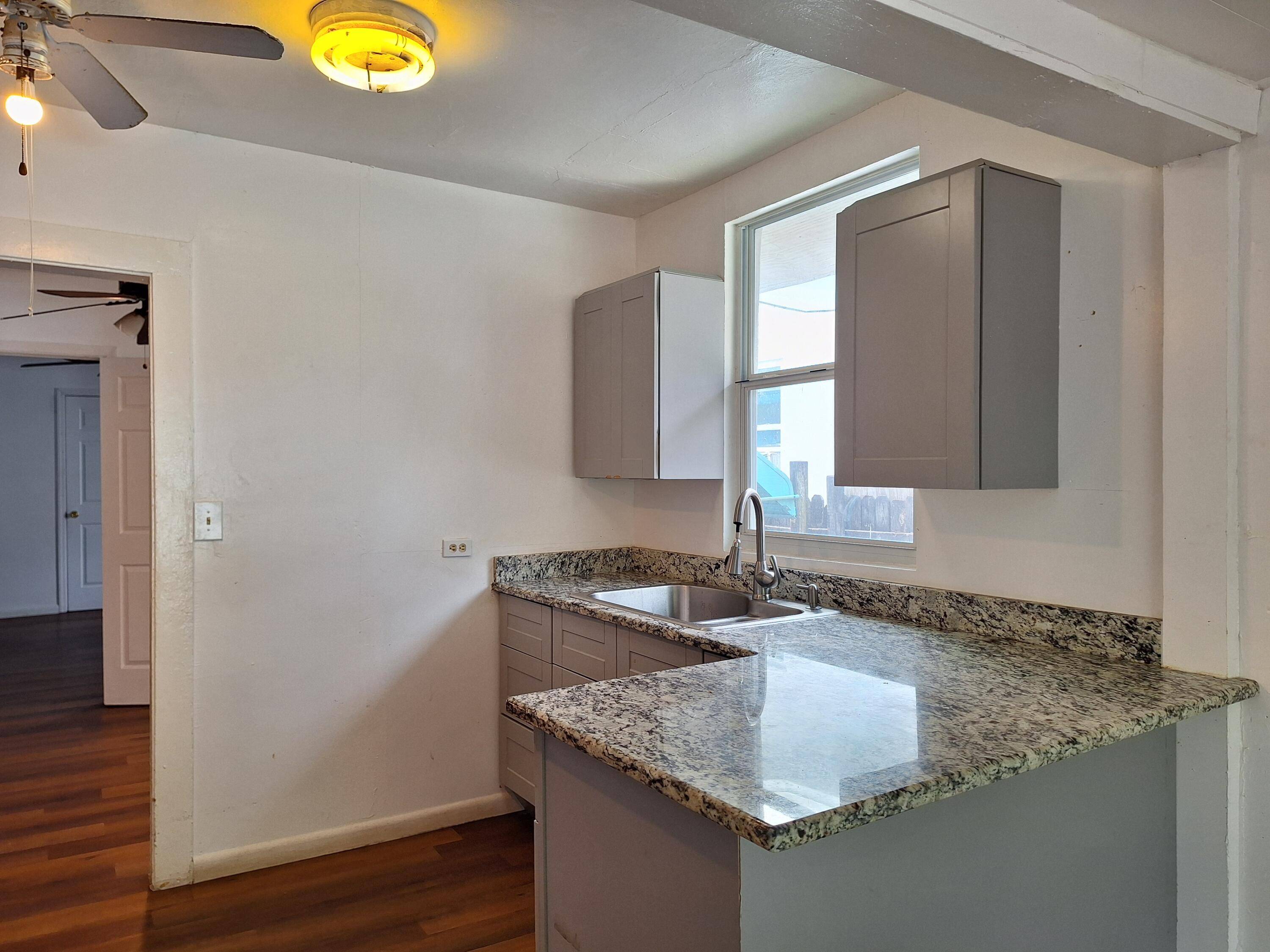 This 4 bed 1 bath den could be converted to 5th bedroom house is conveniently situated near the thriving financial district of downtown West Palm Beach, The Square Cityplace, the ...