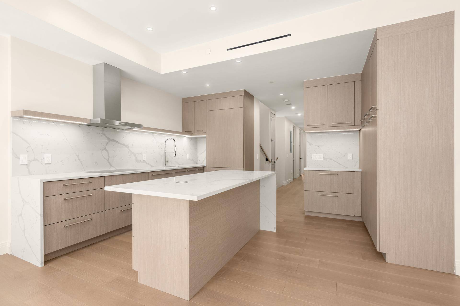 Designed by David Howell of DHD Architecture, this home combines townhouse style living with sleek, modern finishes.