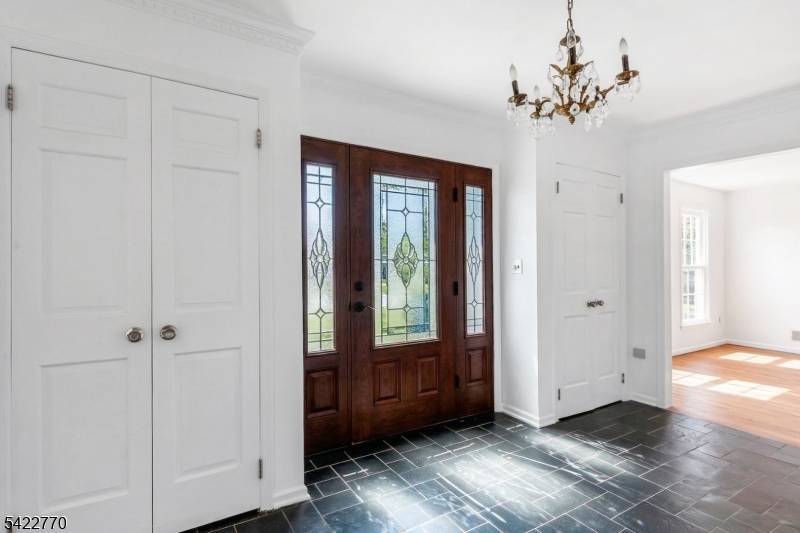 Welcome to this beautifully maintained Colonial in desirable Basking Ridge, NJ, offering 4 bedrooms, 2 full baths, and 1 half bath.