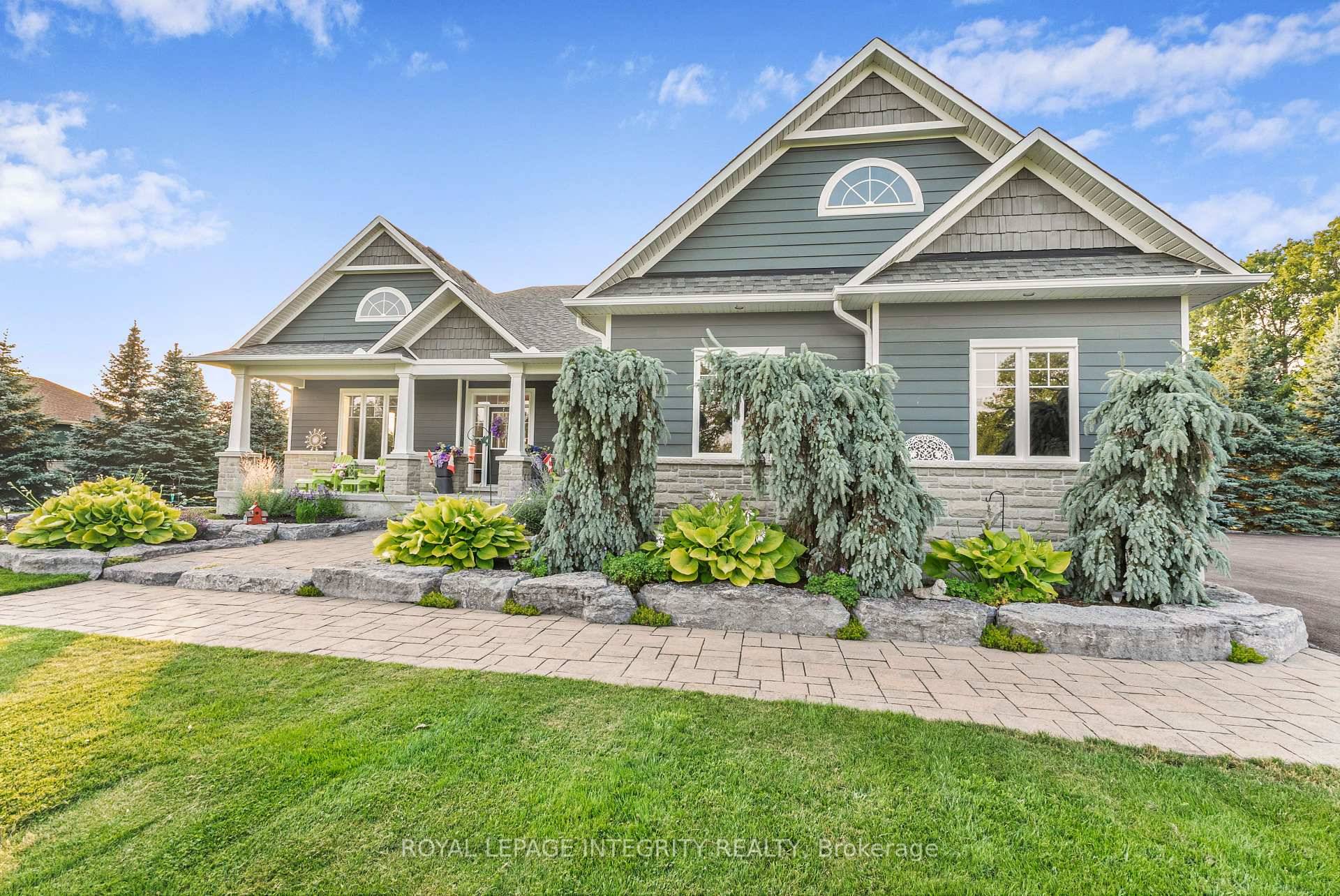 This stunning property offers a luxurious living experience on a beautifully landscaped 1.