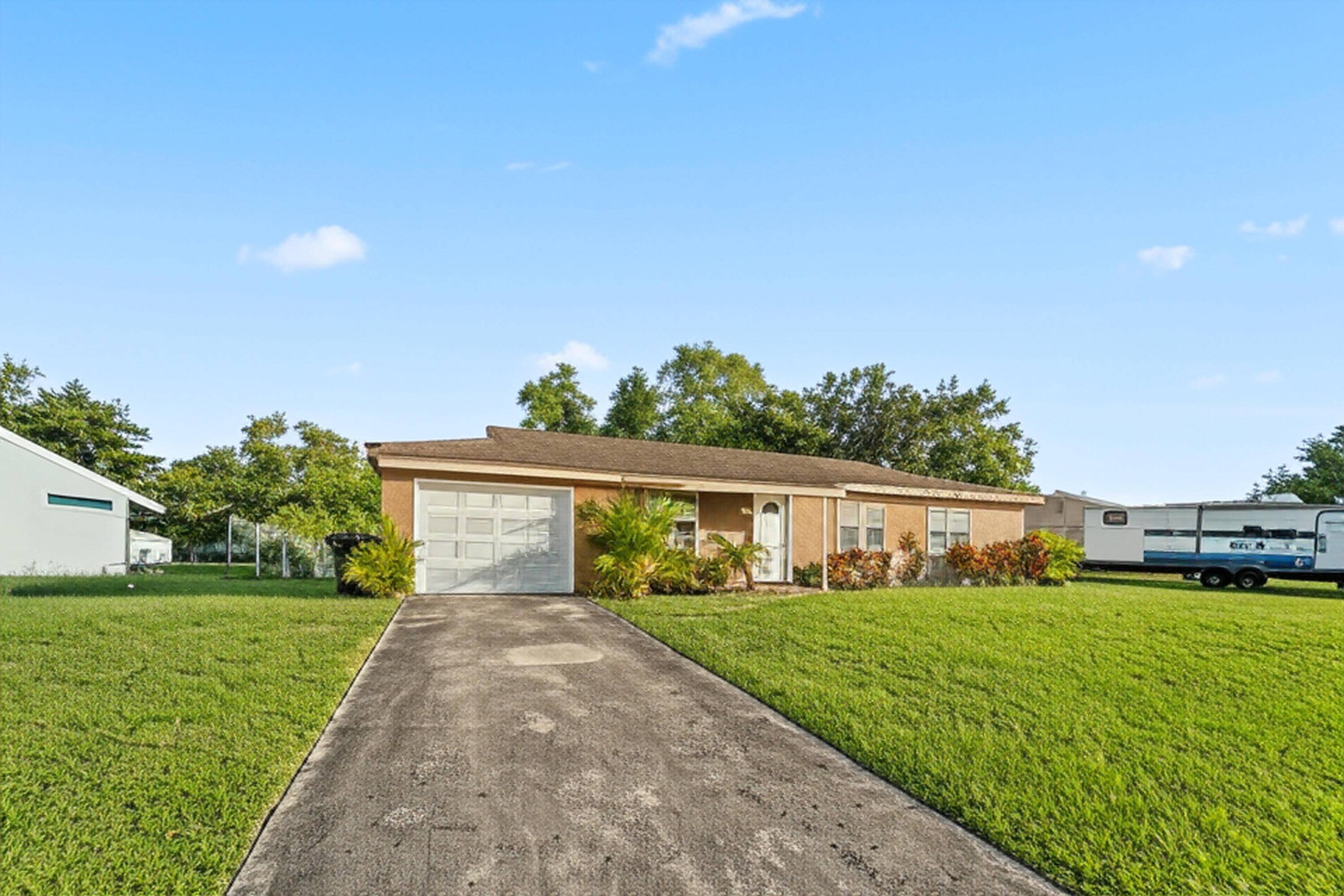 Welcome to 226 SW Kimball Circle a beautifully fully renovated home that blends modern upgrades with timeless charm !