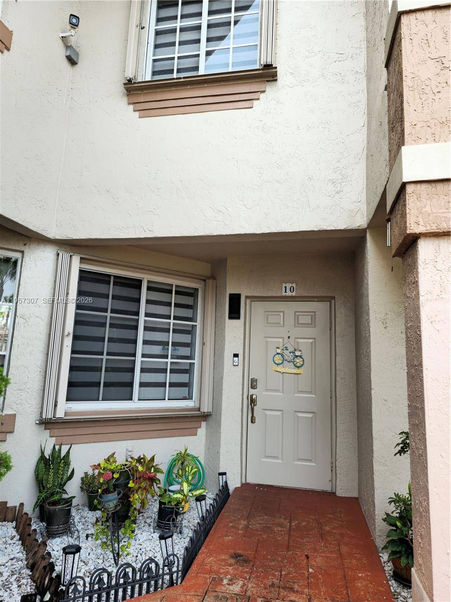 Located within the highly sought after Secret Garden community, this exceptional 3 bedroom, 2.