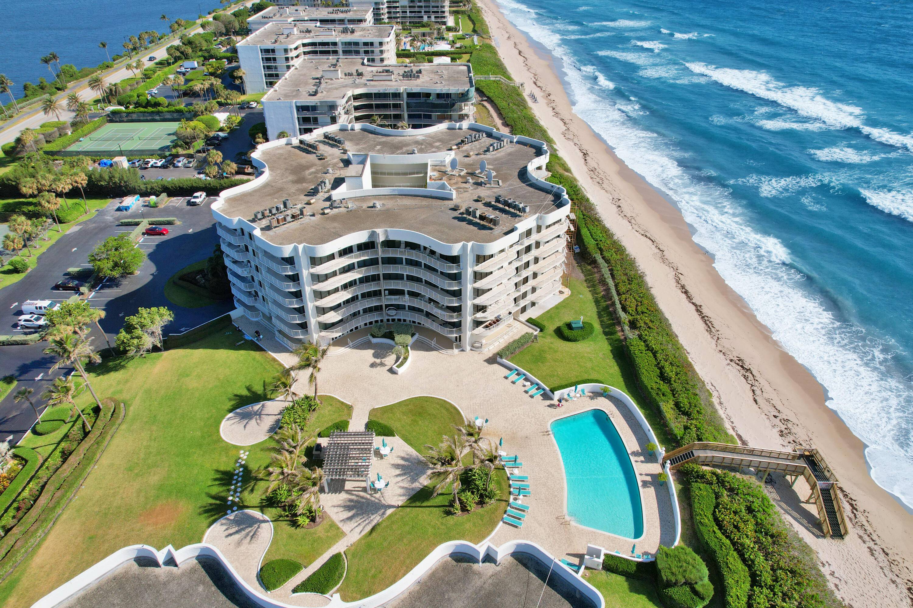 This lanai unit is located directly on the oceanfront and features a terrace that wraps the entire length of the home.