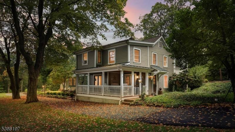 Welcome to this one of a kind restored and updated Farmhouse located on an unusually picturesque mountain top lot within desirable Watchung.