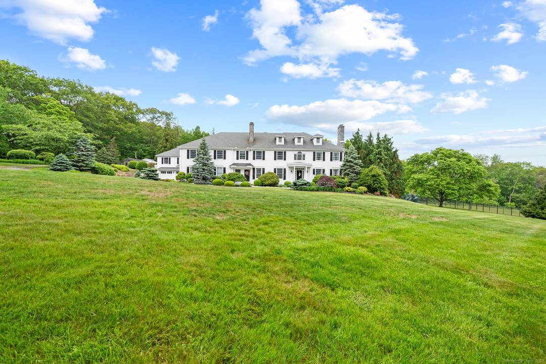 Come see this remarkably private property a stone's throw from the center of Litchfield.