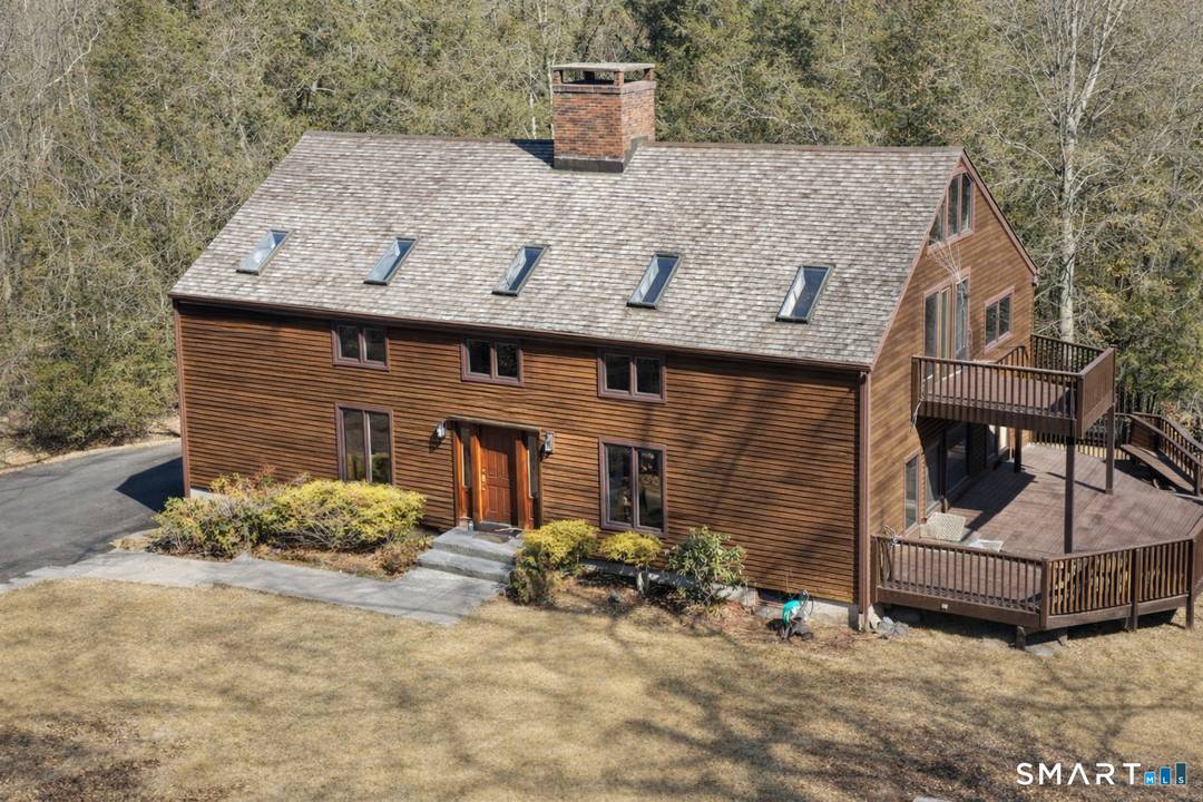 Country Living Abounds with this unique custom built one of a kind Cape nestled on 5 secluded acres.