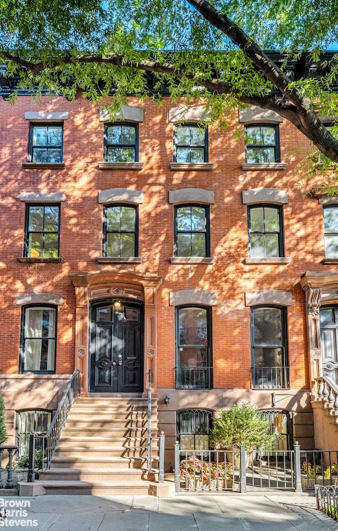 Classic Anglo Italianate style townhouse that is located on one of the loveliest tree lined streets in the West Village.
