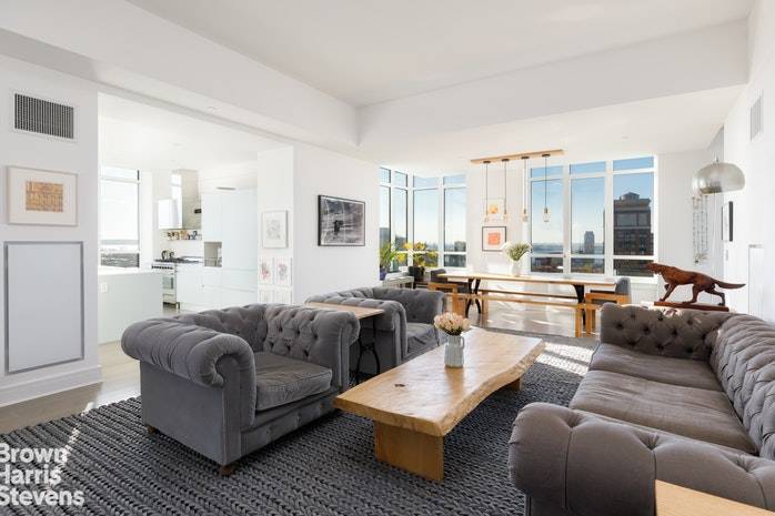 ALL SHOWINGS BY PRIVATE APPOINTMENT Views abound in this spacious and airy Flank designed five bedroom residence at The Boerum.