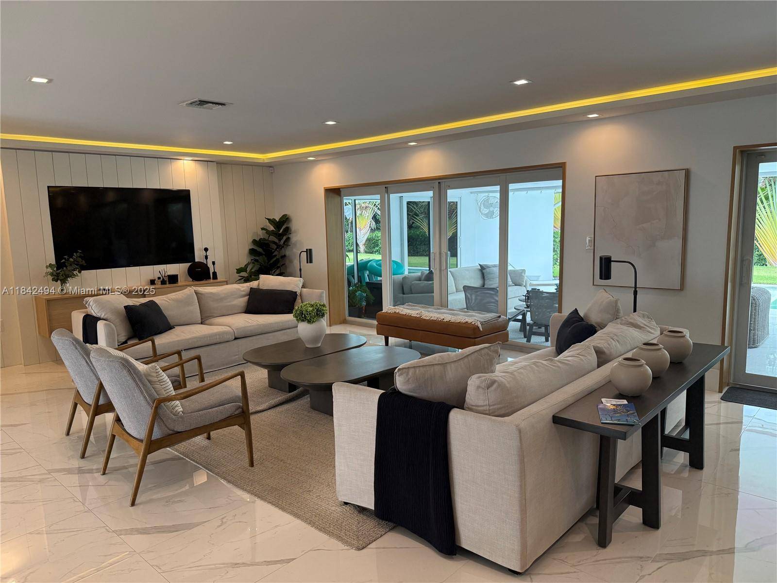A 100 luxuriously renovated golf course home overlooking Shell Bay Golf and Country Club.
