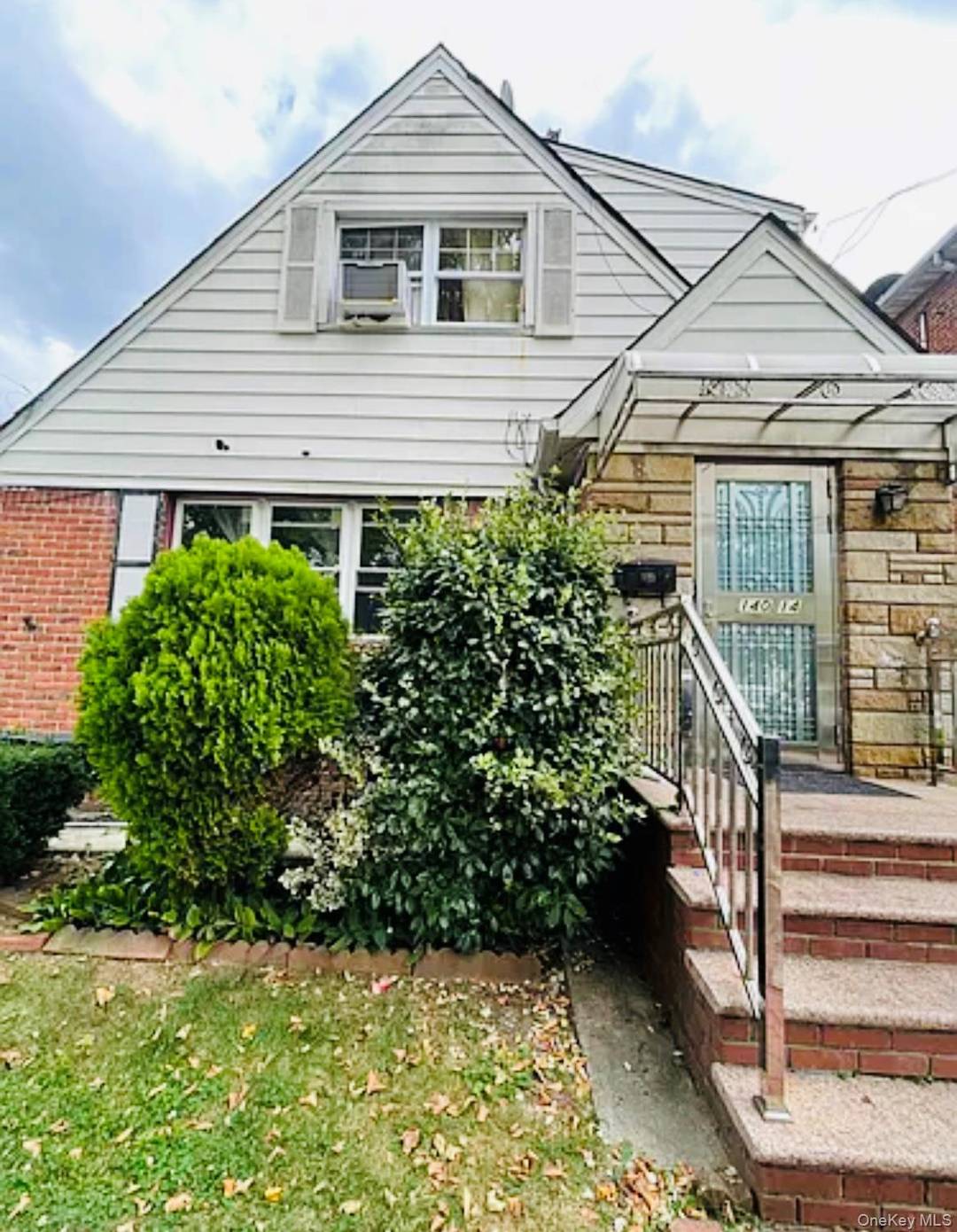 Welcome to this Detached Two Family House Located in the Heart of Flushing.