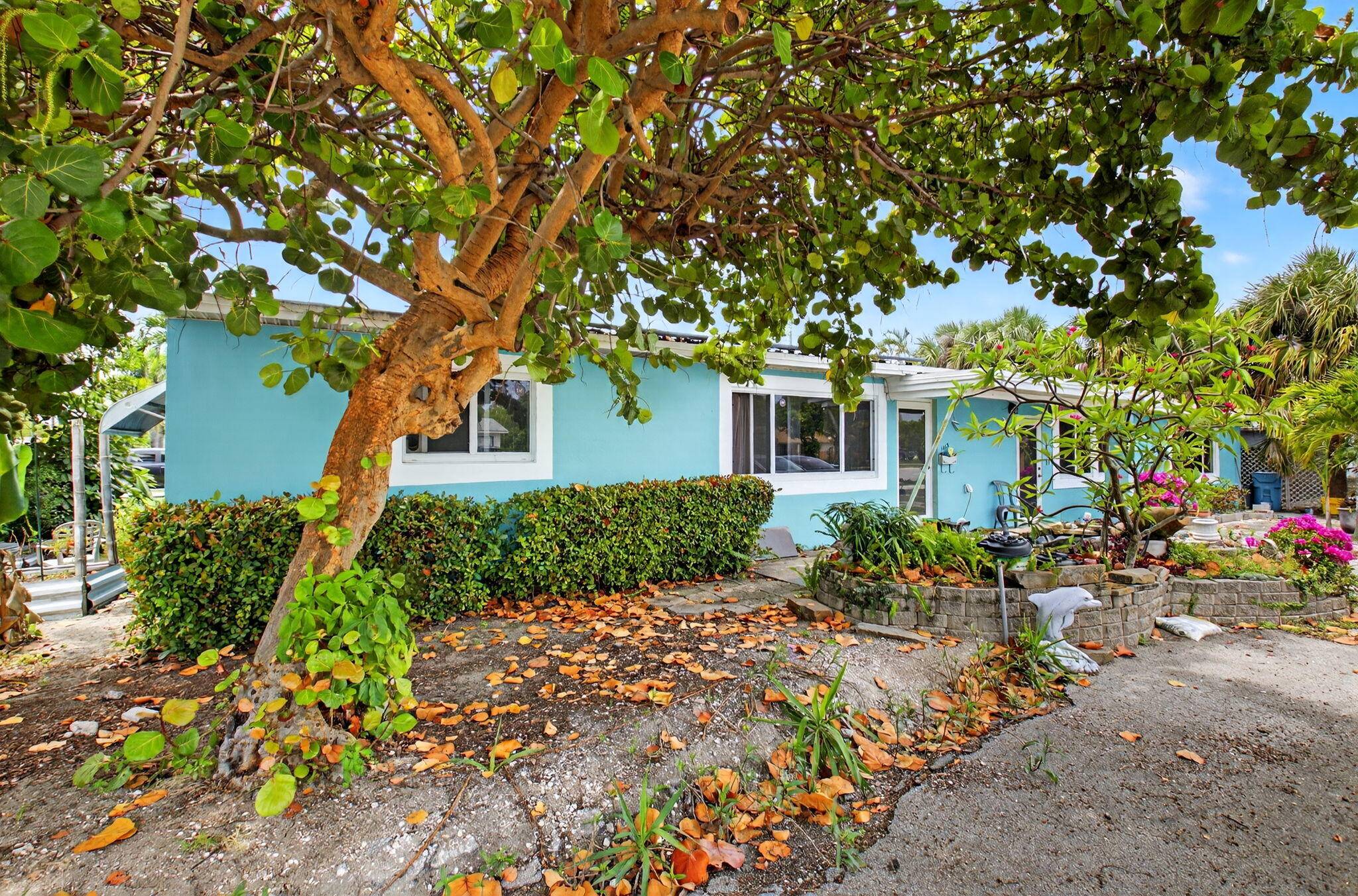 Fantastic opportunity for owners or investors to own this spacious home situated on a prime corner lot in East Boynton Beach with no HOA Fees or restrictions !