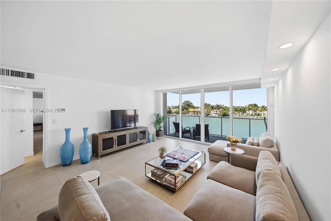Beautifully remodeled corner residence in an iconic Morris Lapidus building in Mid Beach, offering a rare sense of openness and tranquility.