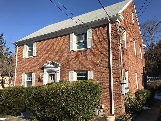 Bright and sunny brick colonial house, two blocks to train station, middle and high school.