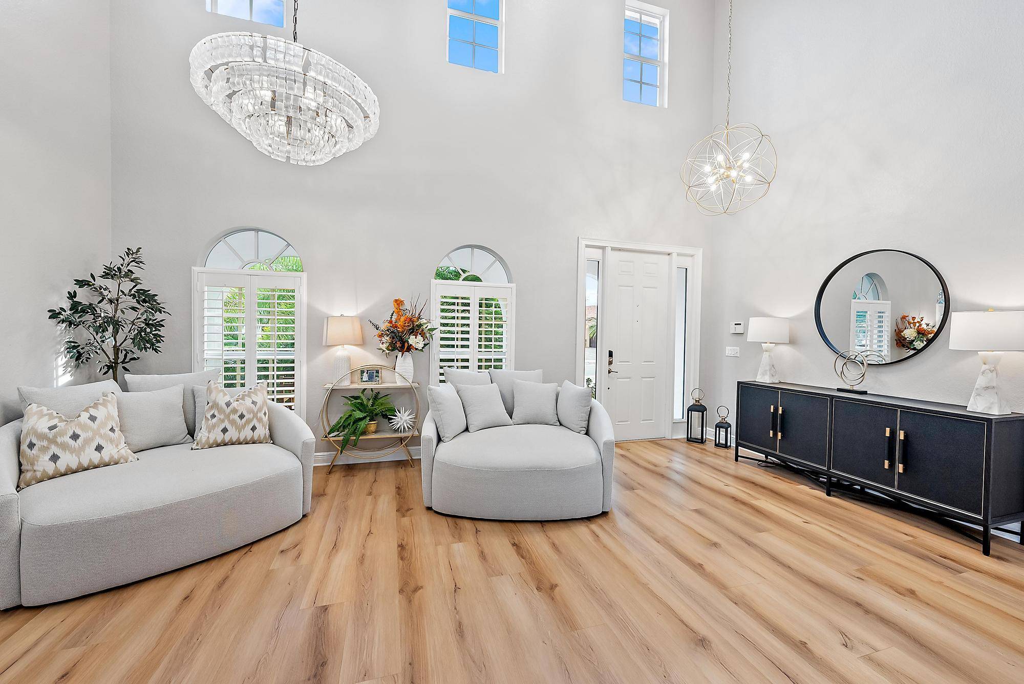 This renovated residence, located in Rialto of Jupiter, offers 3, 591 square feet of living space, five bedrooms, four full bathrooms, plus powder.