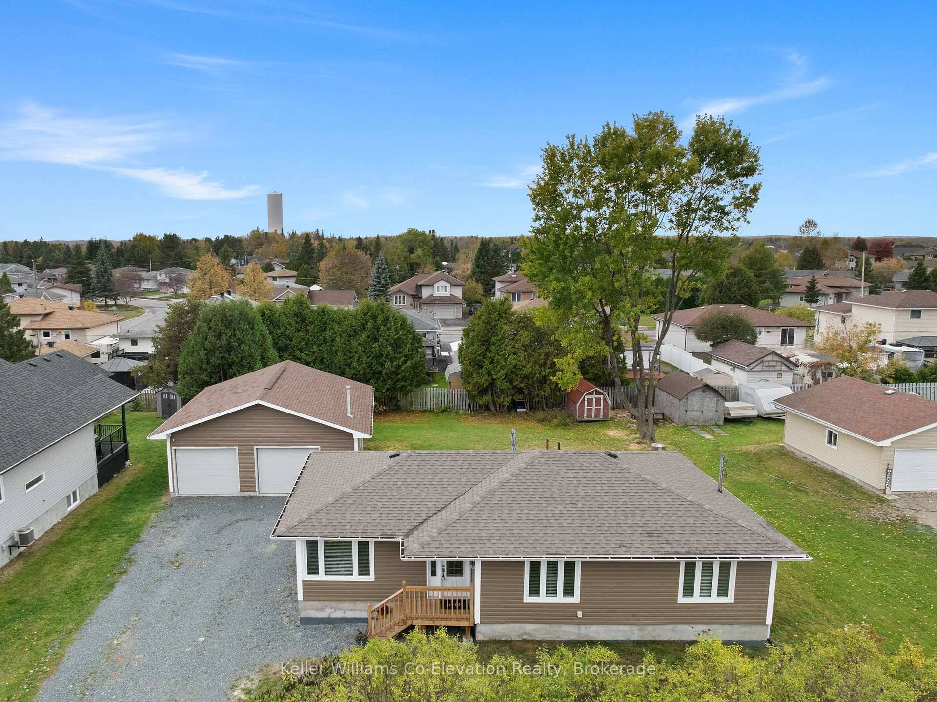 Huge shop, beautiful move in ready home, all on a great lot with a greenhouse and tons of parking.