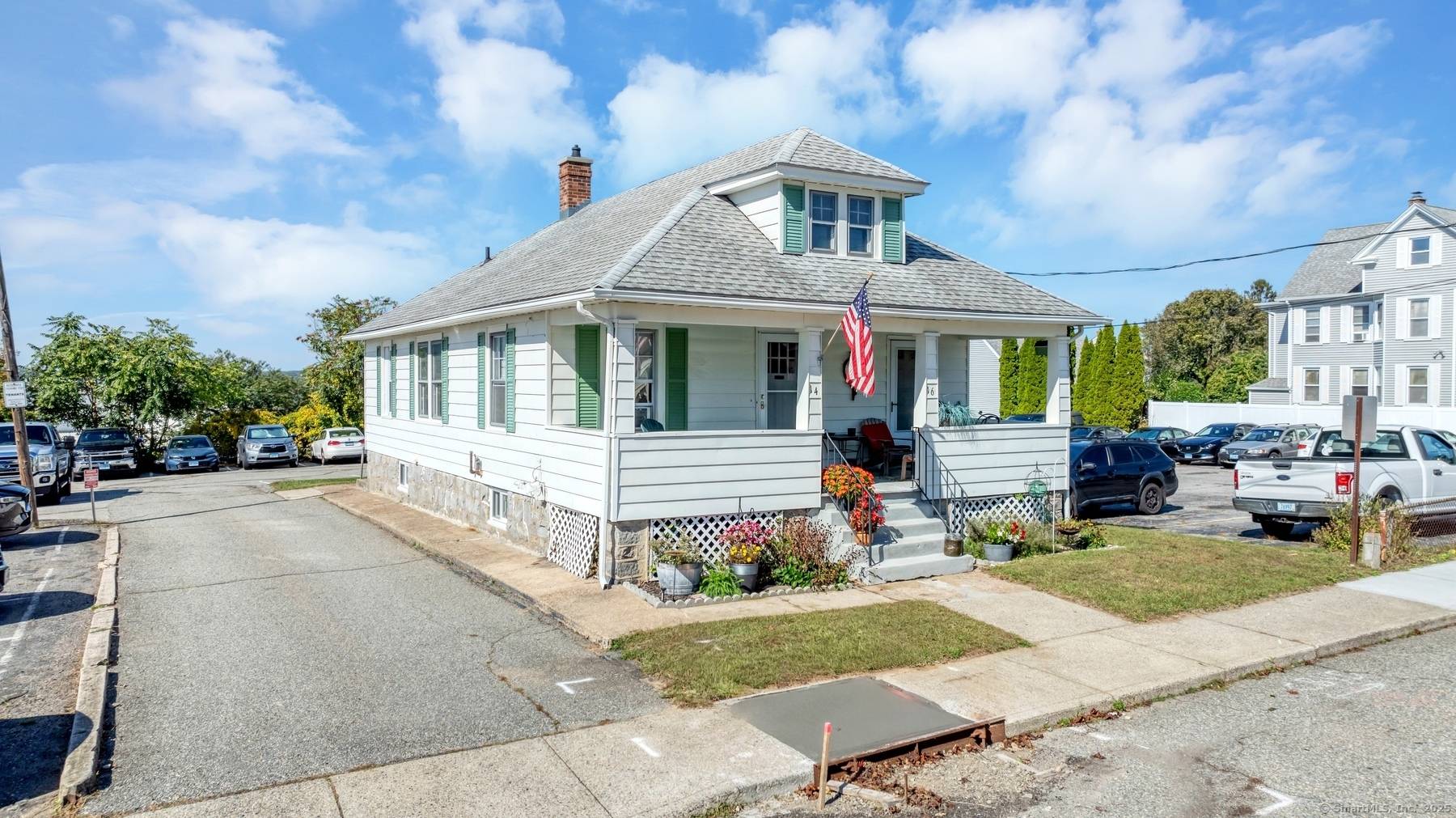 Exceptional multifamily investment opportunity boasting a rare 25 space private parking lot ideally located within walking distance to Electric boat.